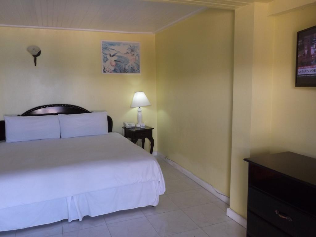 Grandiosa Hotel Teluk Montego Bagian luar foto