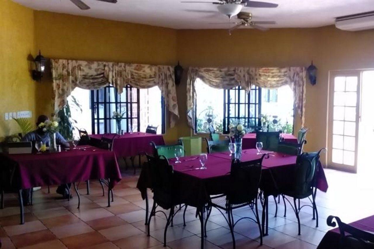 Grandiosa Hotel Teluk Montego Bagian luar foto