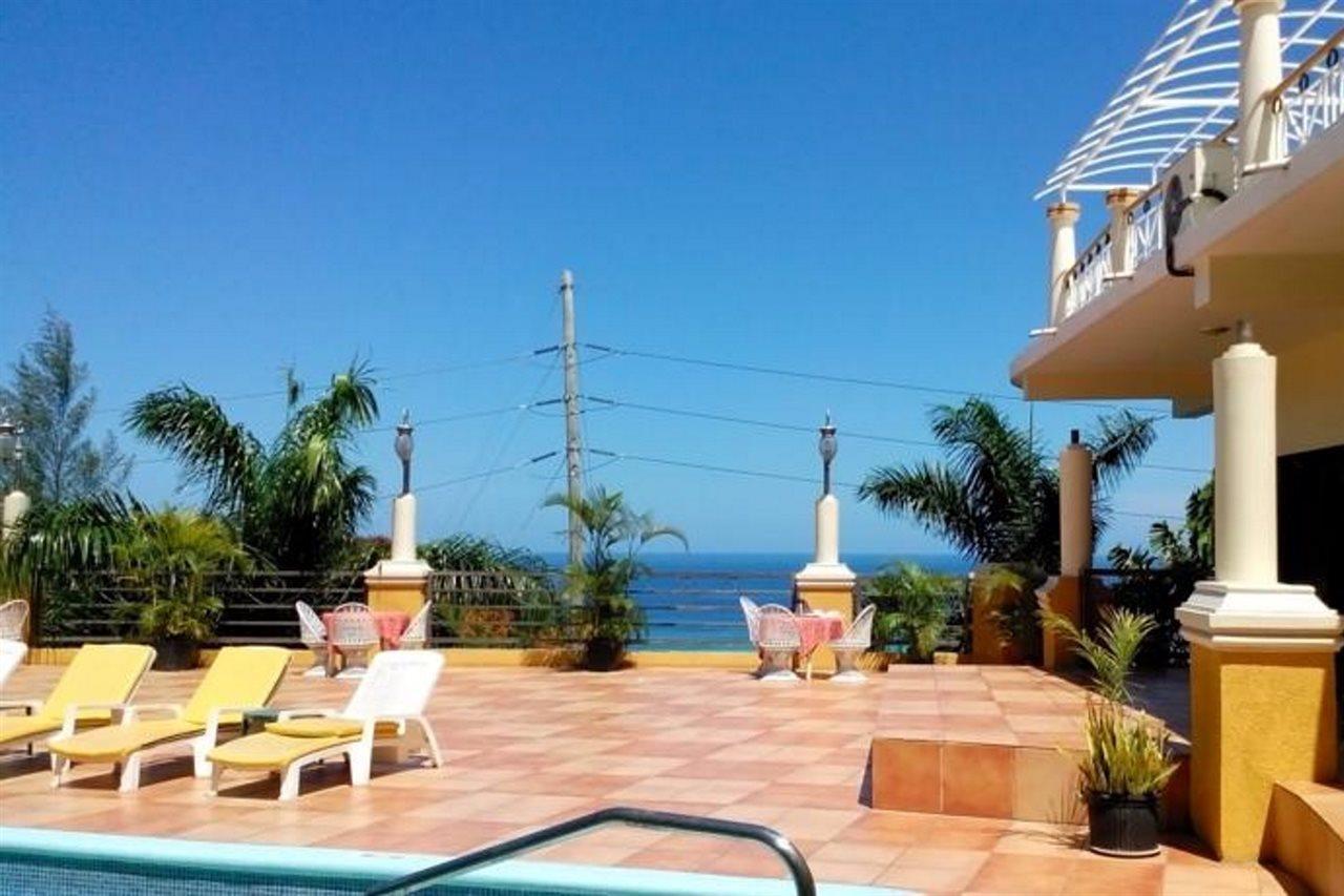 Grandiosa Hotel Teluk Montego Bagian luar foto
